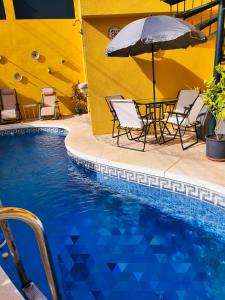 Πισίνα στο ή κοντά στο Paraíso del mar-Chalet privado con piscina propia y vista al mar cerca de la playa