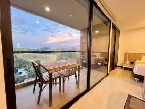 Postel nebo postele na pokoji v ubytování Apartasuite cercana al aeropuerto internacional MED