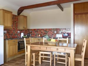 Køkken eller tekøkken på The Owl's Roost - Uk12087