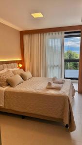 Postel nebo postele na pokoji v ubytování JC Life Residence + 86 fotografií