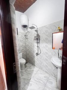 Koupelna v ubytování Masa Nubian House