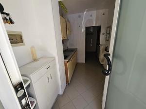 Η κουζίνα ή μικρή κουζίνα στο Tana sul mare +5 φωτογραφίες