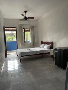 Ένα ή περισσότερα κρεβάτια σε δωμάτιο στο Hotel Costa Rio - Conforto e Hospitalidade em Rio das ostras +20 φωτογραφίες