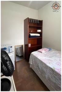 Ένα ή περισσότερα κρεβάτια σε δωμάτιο στο Avenida Paulista Quarto Privado Independente