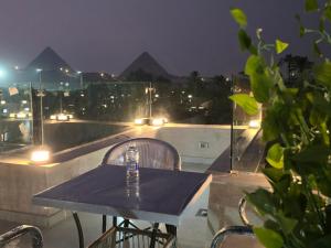 Bazén v ubytování Nakhil Pyramids Resort nebo v jeho okolí