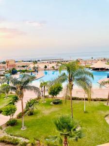 Bazén v ubytování Water Front Porto Sokhna For Familis nebo v jeho okolí