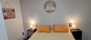 Postel nebo postele na pokoji v ubytování CA LA MIMI, avec vue sur le mont Canigó pour 8 personnes