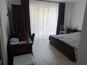 Een bed of bedden in een kamer bij Casa Bogdan