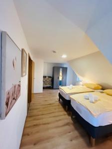 Ένα ή περισσότερα κρεβάτια σε δωμάτιο στο City Stay Schwenningen