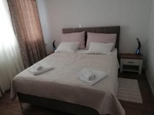 Postel nebo postele na pokoji v ubytování Apartman atHOME