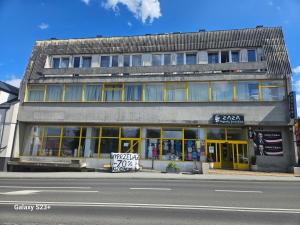 a building on the side of a street at Bobowianka in Bobowa +5 photos