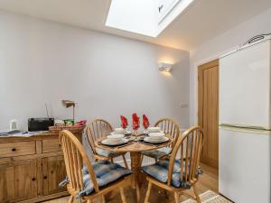 Kuchyň nebo kuchyňský kout v ubytování Cozy Lodges