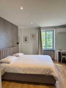 En eller flere senge i et værelse på Villa du Parc de Scey + 51 billeder