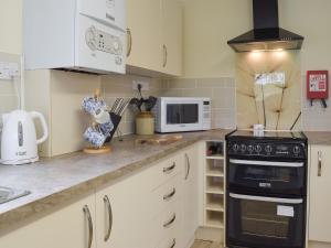 Køkken eller tekøkken på The Old Coach House