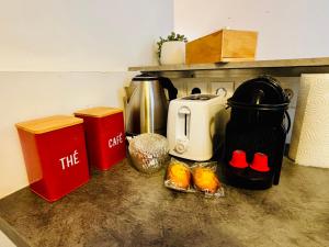 Kuchyň nebo kuchyňský kout v ubytování Coeur de ville - Spacieux 2 chambres