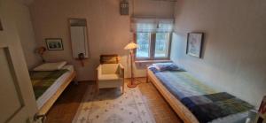 En eller flere senge i et værelse på Perinnetalo Taivalkoskella + 6 billeder