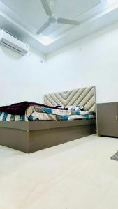 Giường trong phòng chung tại Hotel Haritage residency