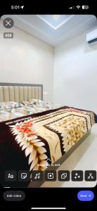 Giường trong phòng chung tại Hotel Haritage residency