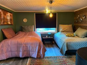 Ένα ή περισσότερα κρεβάτια σε δωμάτιο στο Little Home