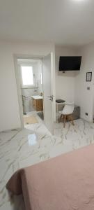 TV a/nebo společenská místnost v ubytování La piazza