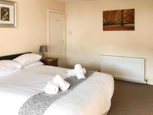 Ένα ή περισσότερα κρεβάτια σε δωμάτιο στο Wendover