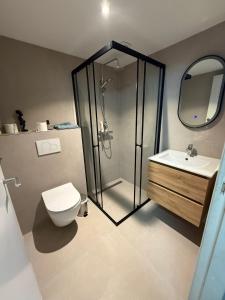 Koupelna v ubytování Het werkhuis, terug in de tijd