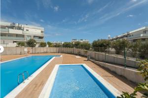 a swimming pool on the roof of a building at Tejita Beach in La Tejita