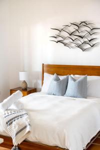 Ένα ή περισσότερα κρεβάτια σε δωμάτιο στο Kyo I Rustic Villa Beach/Golf Paradise in Rio Mar +40 φωτογραφίες