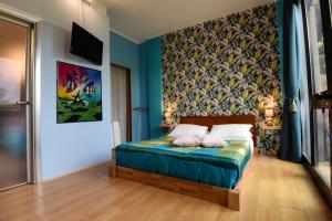 Postel nebo postele na pokoji v ubytování Suite con SPA Privata - Hotel Riva Etrusca