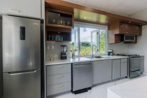 Kuchyň nebo kuchyňský kout v ubytování Pastoreo | River Trail | Generator | Morovis, PR