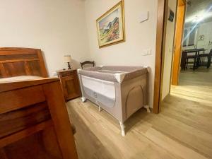 Giường trong phòng chung tại Casa Amadio - stile rustico comfort moderno