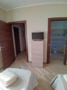 TV a/nebo společenská místnost v ubytování Casa vacanza P&G