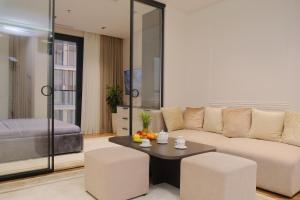 Posezení v ubytování Nest One Luxe, Элитные апартаменты с балконом и видом на фонтан Tashkent City Park 110