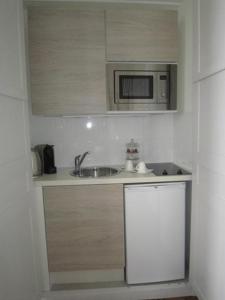 Η κουζίνα ή μικρή κουζίνα στο Le Lagon