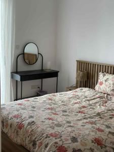 Ένα ή περισσότερα κρεβάτια σε δωμάτιο στο Aphrodites Resident