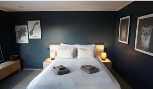 Ένα ή περισσότερα κρεβάτια σε δωμάτιο στο Ocean Panorama