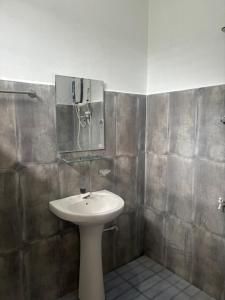 Ένα μπάνιο στο Amis homestay Jaffna