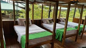 Ένα ή περισσότερα κρεβάτια σε δωμάτιο στο Raalmadu Wilpattu +50 φωτογραφίες