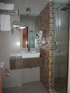 Kylpyhuone majoituspaikassa Hotel Civic Express