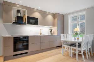 Køkken eller tekøkken på Jordeplegarden Apartments