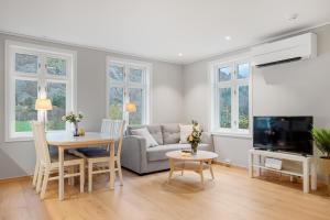 Et tv og/eller underholdning på Jordeplegarden Apartments