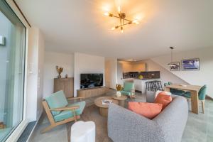 Μια τηλεόραση ή/και κέντρο ψυχαγωγίας στο Halternative Residence Muscari