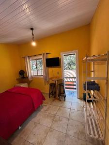 TV a/nebo společenská místnost v ubytování Pousada Flor da Mata