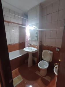 Ένα μπάνιο στο apartament rovine