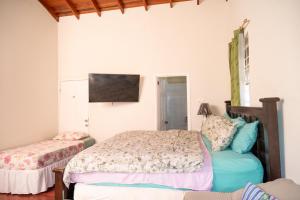 Ένα ή περισσότερα κρεβάτια σε δωμάτιο στο BLR Villas Dover Beach +129 φωτογραφίες