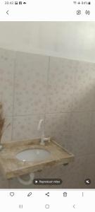 a picture of a bathroom with a sink at Brisa Oceanica in Itarema