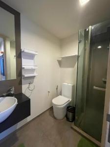 Ένα μπάνιο στο Condo Pattaya Stays