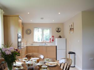 Kuchyň nebo kuchyňský kout v ubytování The Lodge + 10 fotografií