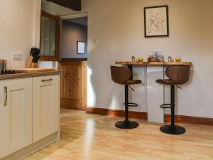 Kuchyň nebo kuchyňský kout v ubytování Mill Top