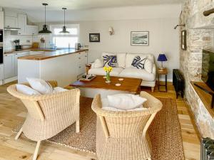 Kuchyň nebo kuchyňský kout v ubytování The Basket Loft